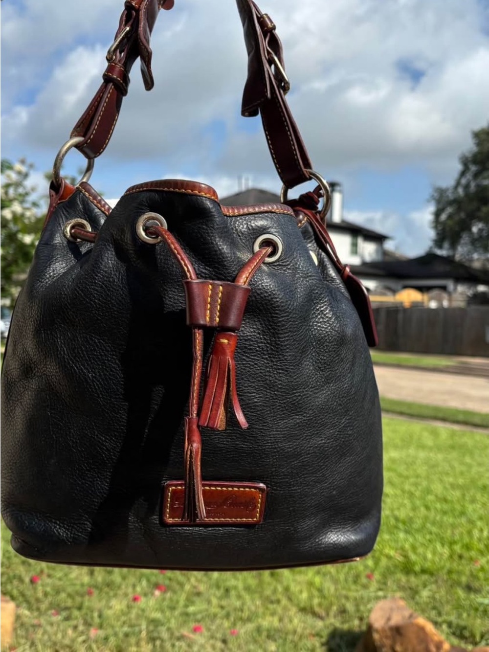 Dooney & Bourke Black Leather Bucket Shoulder Bag with Brown Trim